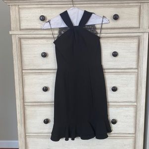Little black dress with open lace back accent